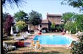 Italian holiday rental apartments in Tuscany, close to Cortona. Vacation lodging in apartments for four people, swimming pool.